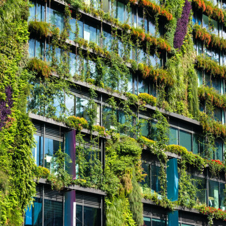Eco architecture. Green skyscraper with hydroponic plants on the facade. Ecology and green living in city, urban environment concept. Park in the sky, One central park building, Sydney, Australia
