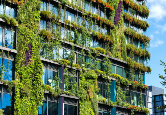 Eco architecture. Green skyscraper with hydroponic plants on the facade. Ecology and green living in city, urban environment concept. Park in the sky, One central park building, Sydney, Australia